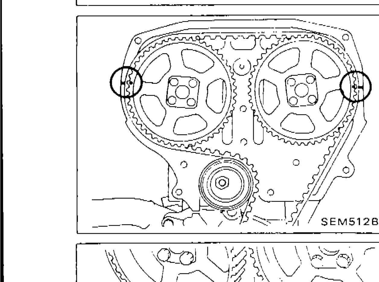 Camshaft sprockets and timing belt with TDC alignment marks visible