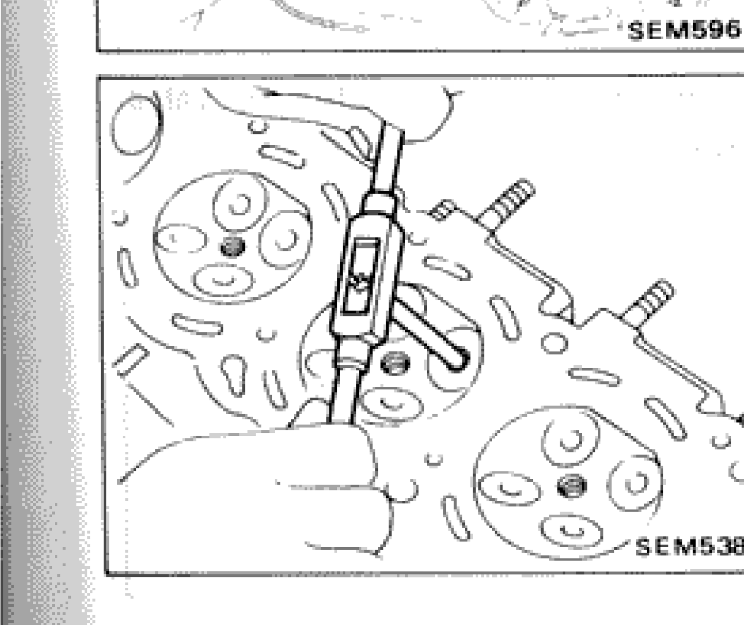 Reaming cylinder head valve guide hole with reamer tool