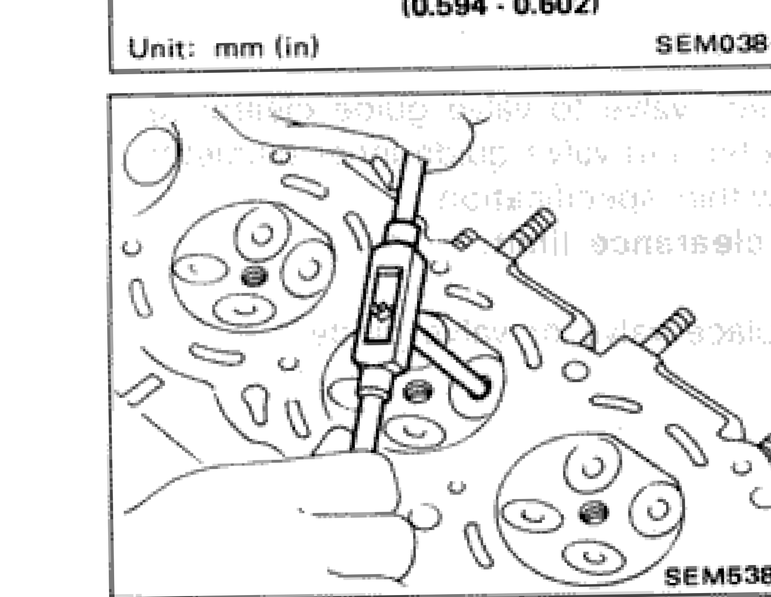 Illustration showing reaming of valve guide in cylinder head