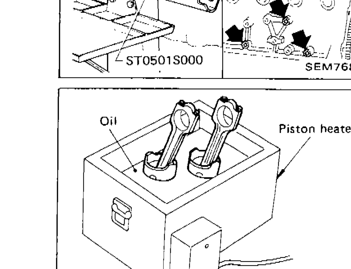 Piston heater oil bath being used to heat piston for disassembly from connecting rod