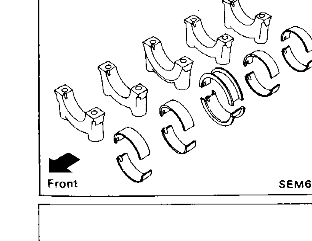 Main bearing halves laid out showing front orientation