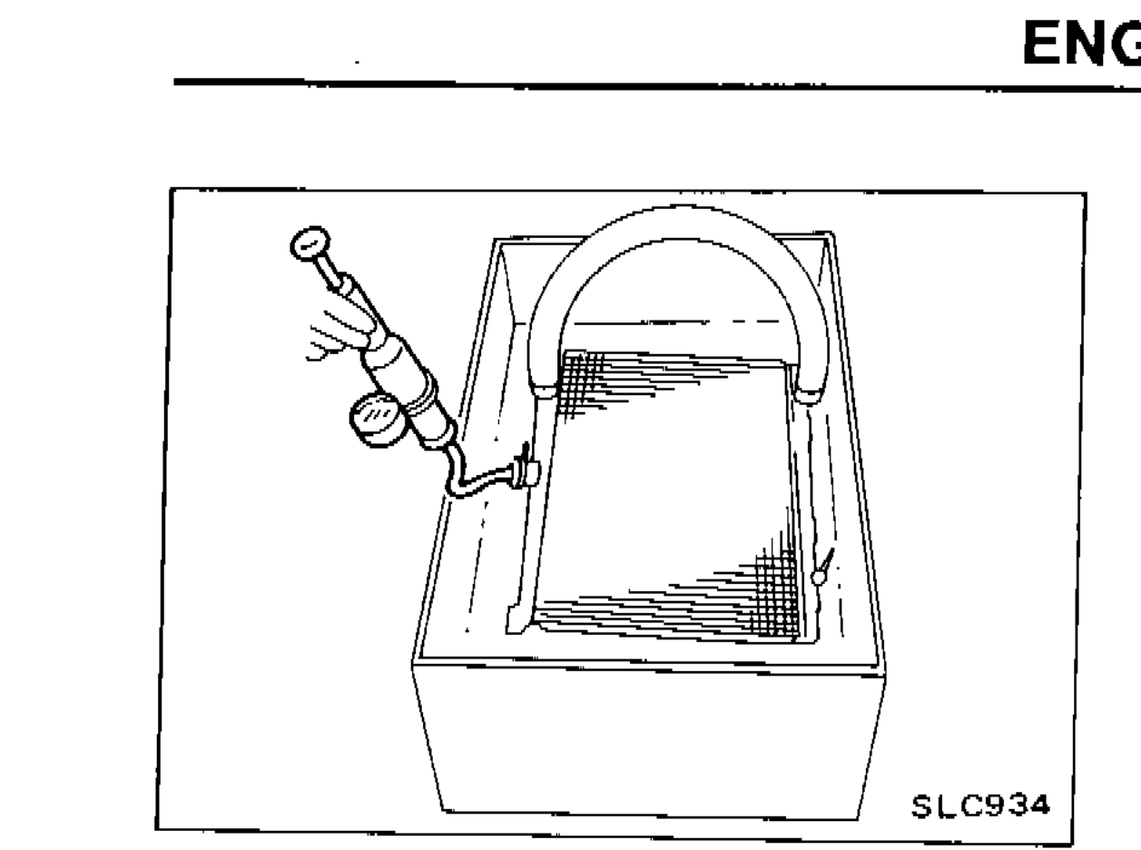 Radiator leakage check — radiator submerged in water tank for pressure leak test