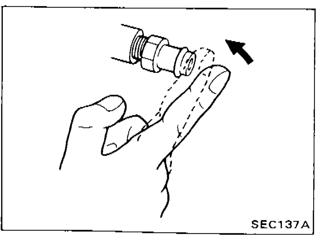 Illustration showing hand removing ventilation hose from PCV valve for inspection