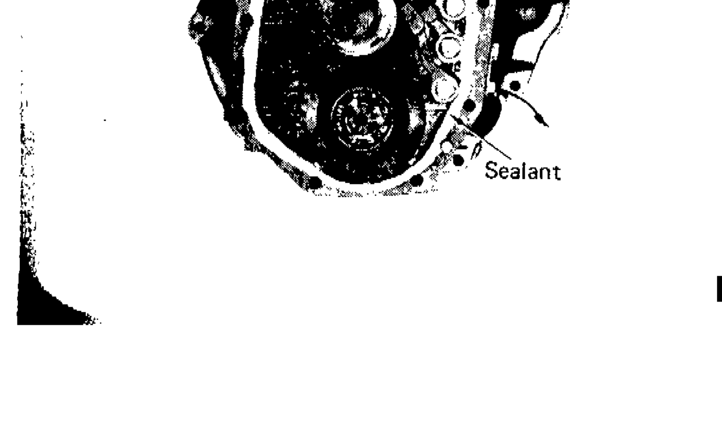 Adapter plate mating surface with sealant applied, rear extension installation