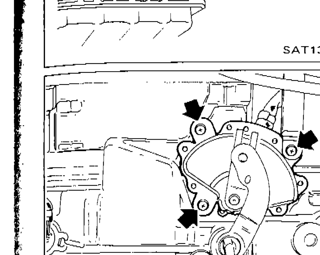 Inhibitor switch on A/T assembly showing fixing bolts and arrows indicating location