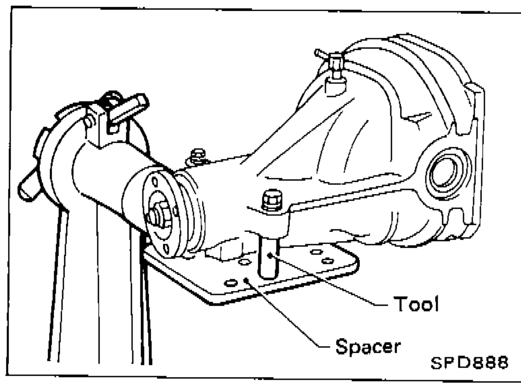Differential carrier mounted on tool KV38100800 with spacers. Labels: Tool, Spacer