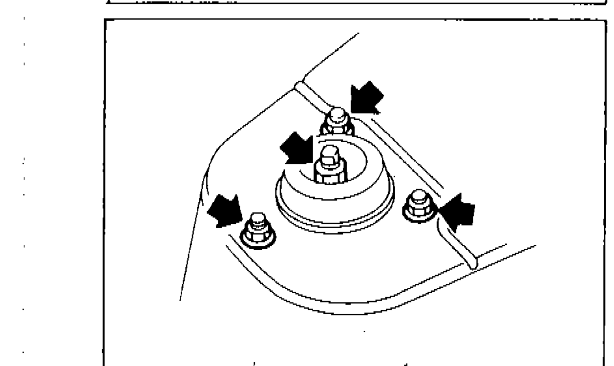 Strut top mount nuts with arrows indicating tightening points