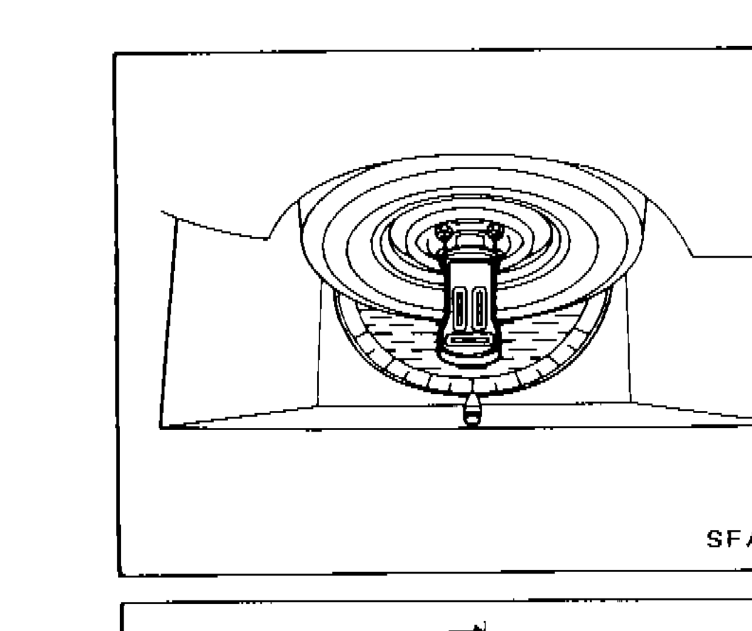 Top view of front strut/suspension upper mount showing camber/caster adjustment area