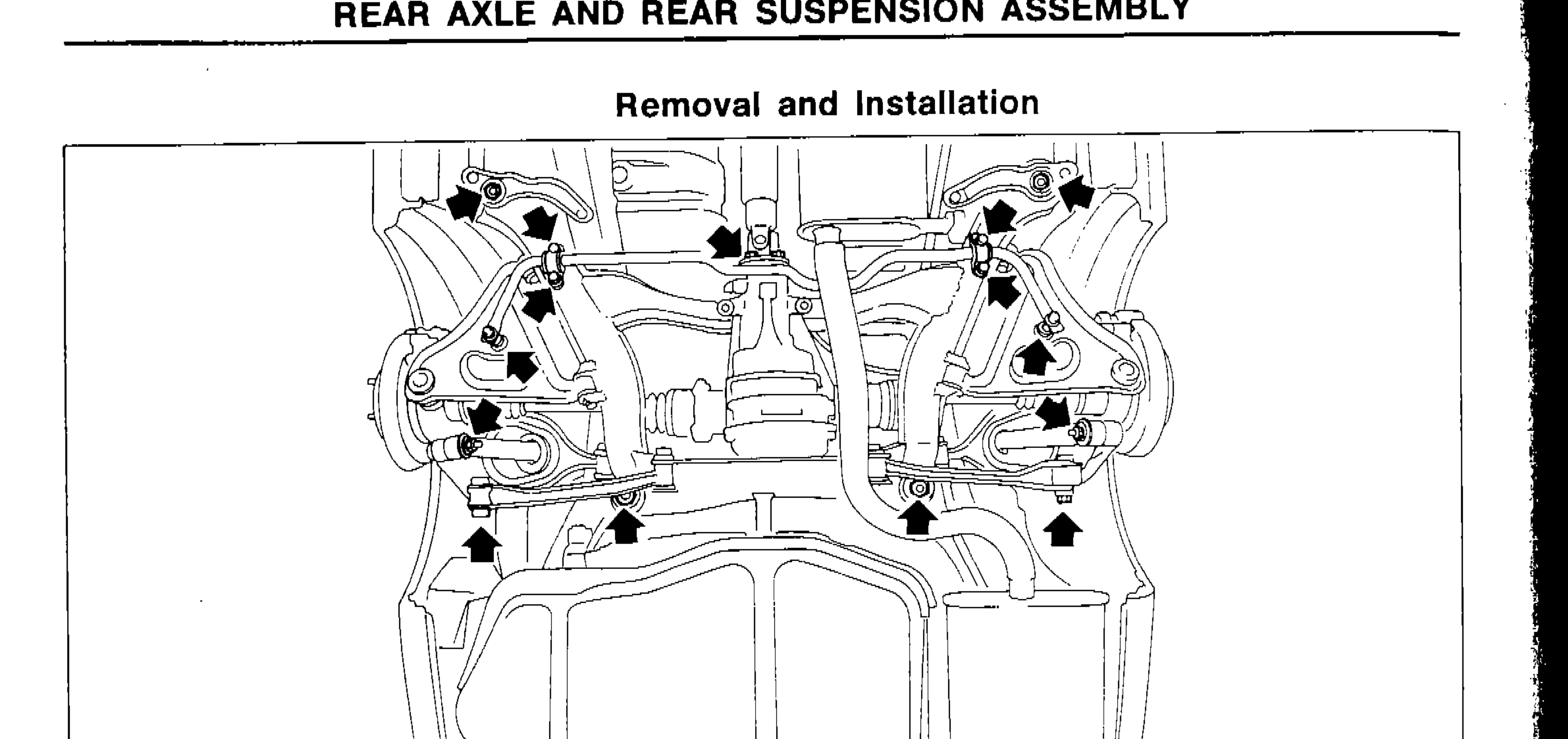 Underside view of rear axle and rear suspension assembly showing bolt/nut removal points indicated by arrows