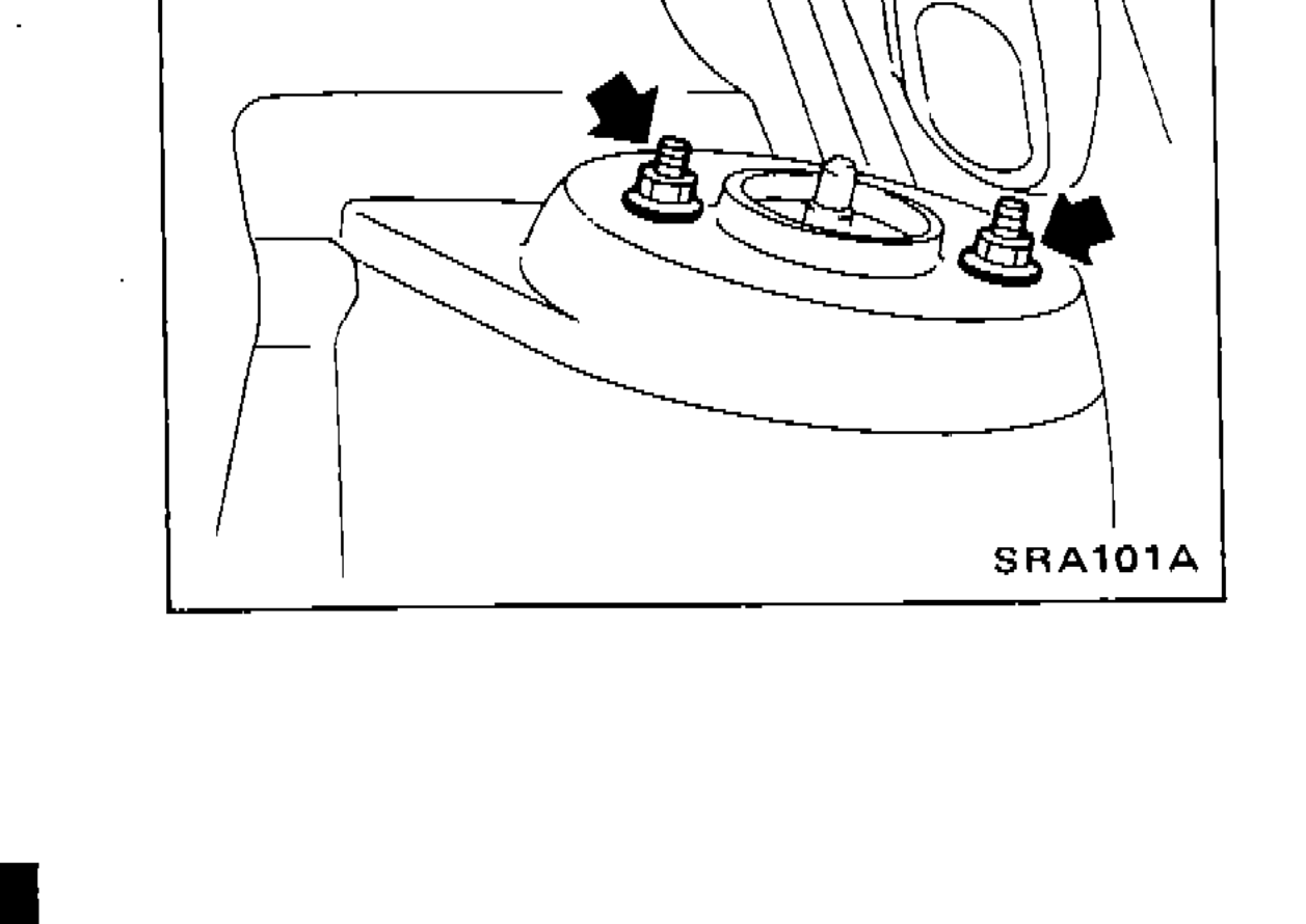 Close-up view of shock absorber upper end nuts with arrows indicating removal points