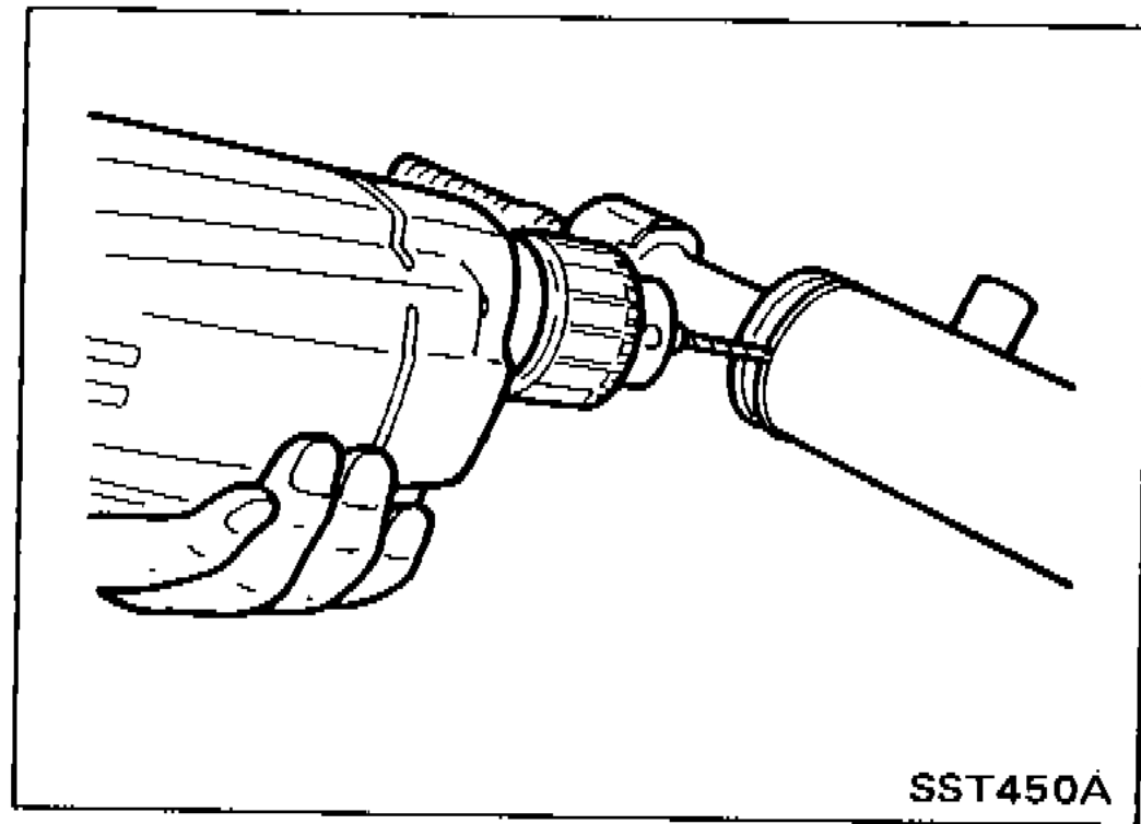 Drill with 2 - 2.5 mm bit drilling out the staked portion of the gear-housing end before removing the end cover.